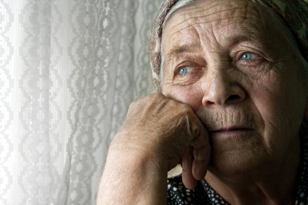 Portrait of sad lonely pensive old senior woman